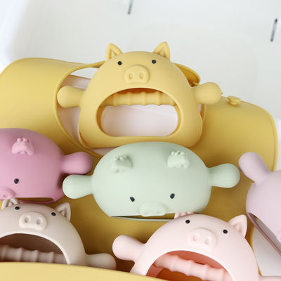 Tùy chỉnh nhiều hình dạng khác nhau Hình dạng tay cầm hình con lợn Miếng dán silicone cho bé với nhiều kiểu dáng khác nhau