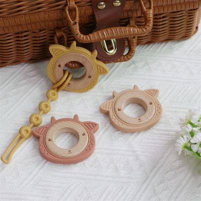 Multifunctional silicone baby teether với răng đính nối vòng gỗ mẫu động vật