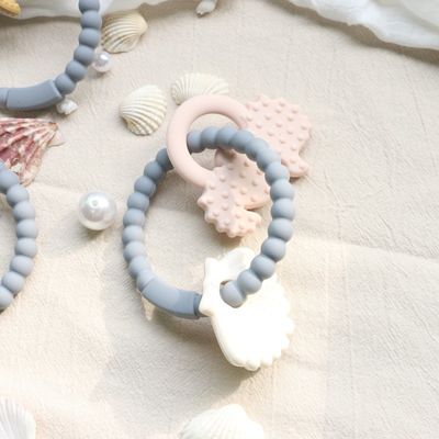 Dòng răng silicone cho trẻ em với thiết kế không độc hại và dễ cầm tay cầm và nhẫn răng silicone không chứa BPA