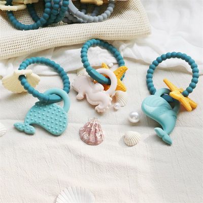 Dòng răng silicone cho trẻ em với thiết kế không độc hại và dễ cầm tay cầm và nhẫn răng silicone không chứa BPA