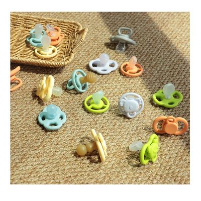 bán buôn màu sắc khác nhau có sẵn trong kho giao hàng nhanh chóng miễn phí BPA trẻ em răng nhẹ nhàng trẻ em mềm silicone ngực